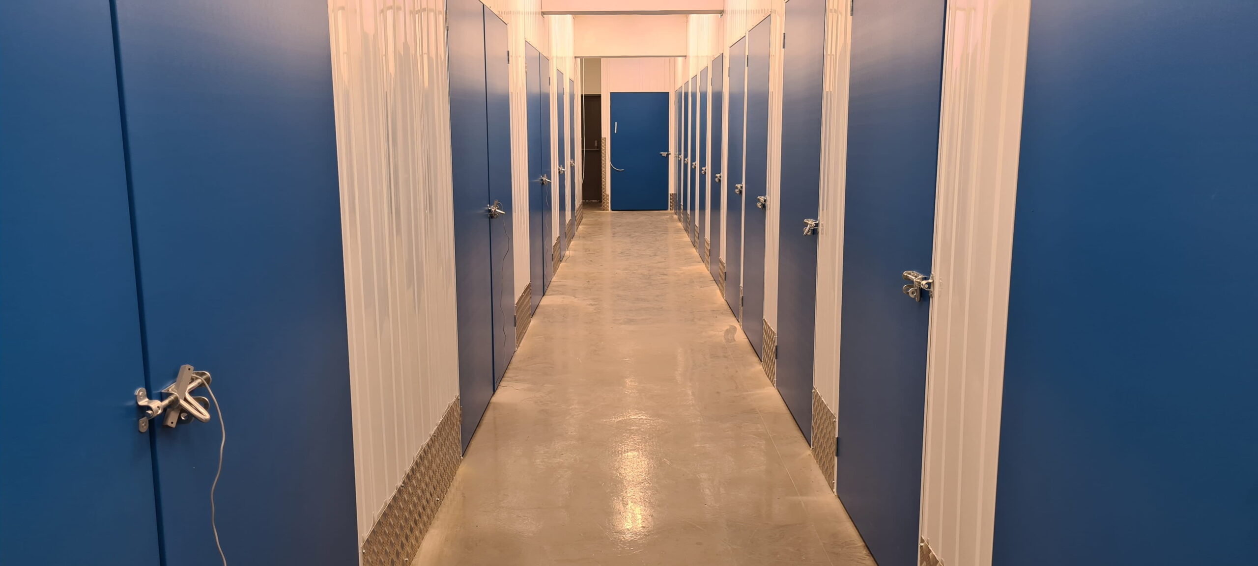 Interior view of the Trunk Self Storage indoor self storage facilities at Unit 8 and Unit 9, Tower Road, Grays, Essex RM17 6ST. The site provides clean, secure indoor storage rooms with 24/7 access, flexible monthly pricing, and collection and delivery options for customers across Thurrock, Brentwood, and East London.