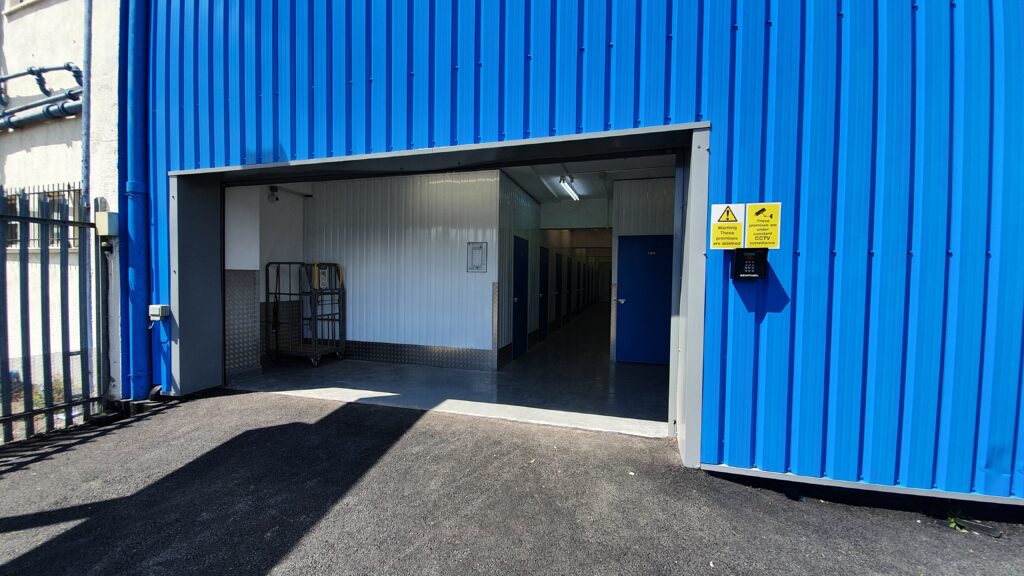 Entrance to indoor self storage rooms at Unit 8 and 9 Tower Road Grays Essex showing secure access and loading area