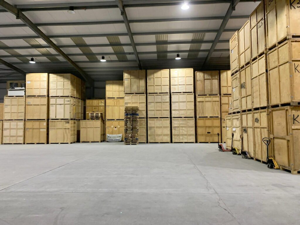 Warehousing in Grays and Thurrock High-stacked wooden storage crates inside secure Grays warehouse facility