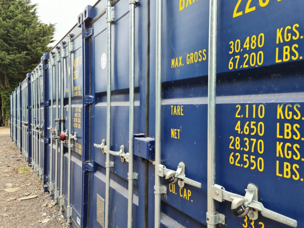 Self Storage Upminster Row of secure blue drive-up steel shipping containers for self storage at Trunk Self Storage